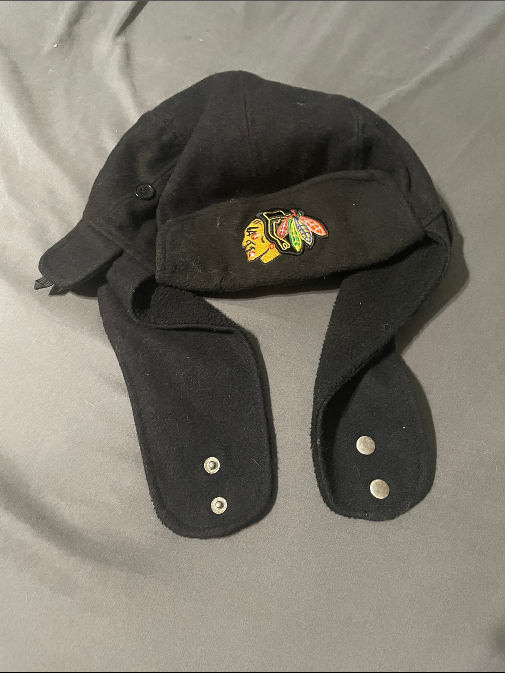 New Era Black Fleece Trapper Hat with Embroidered Chicago Blackhawks Logo